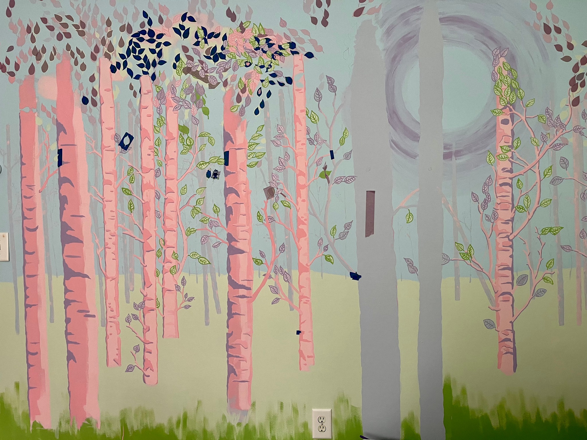 Tree trunks with scanty leaves. An incomplete painting of a fantasy forest.